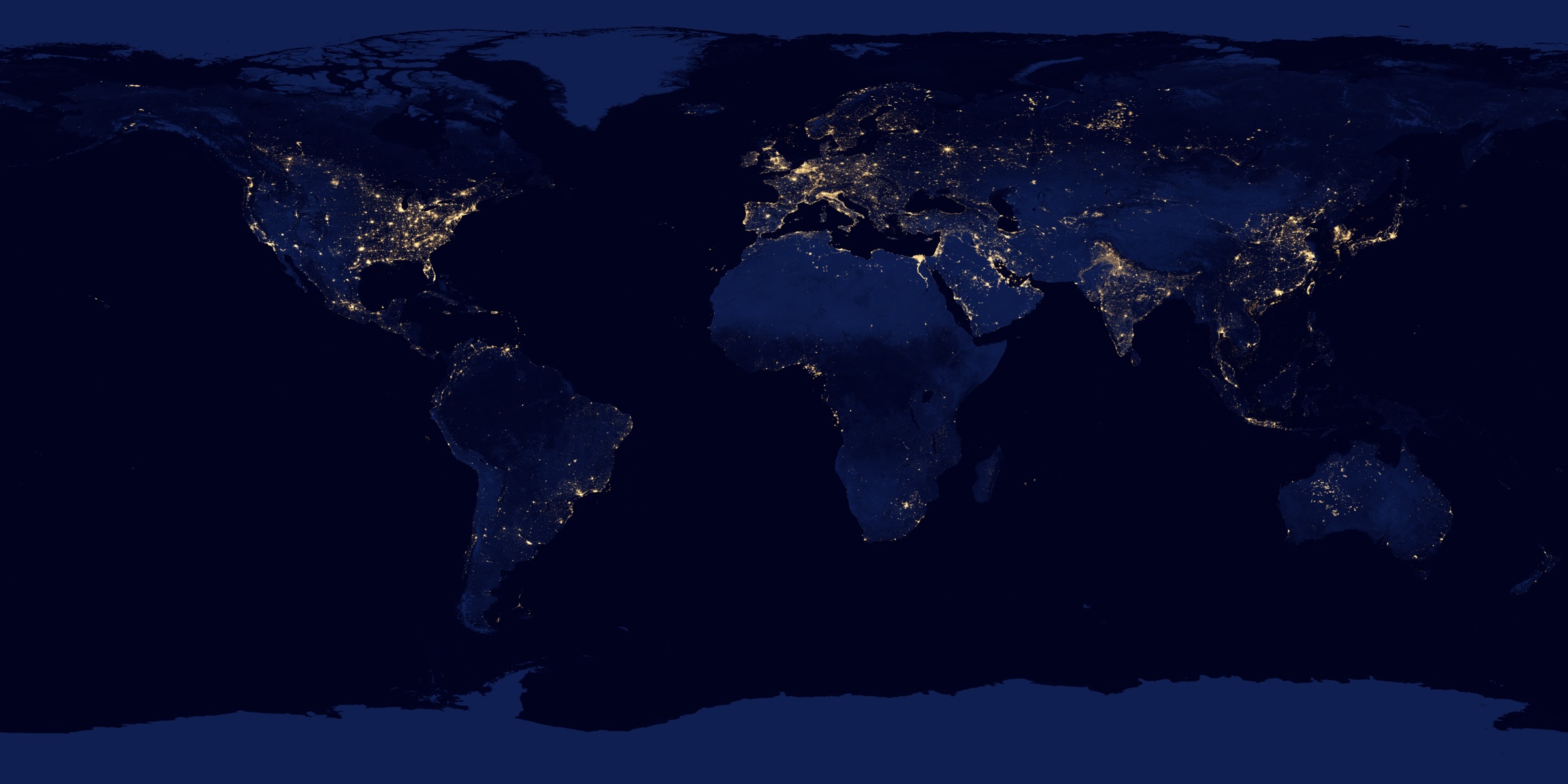 Earth at night from space — global network of city lights symbolizing international trade and consulting reach
